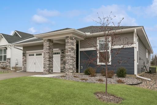 Side angle of the front of the house - note the wide landscape beds.