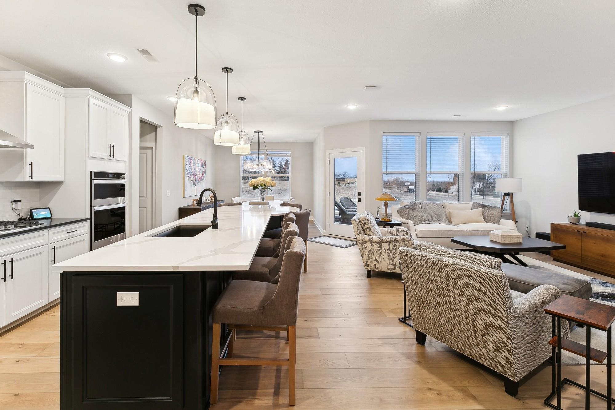 Open flow floor plan with the kitchen, living space and the dining room. Excellent for entertaining.