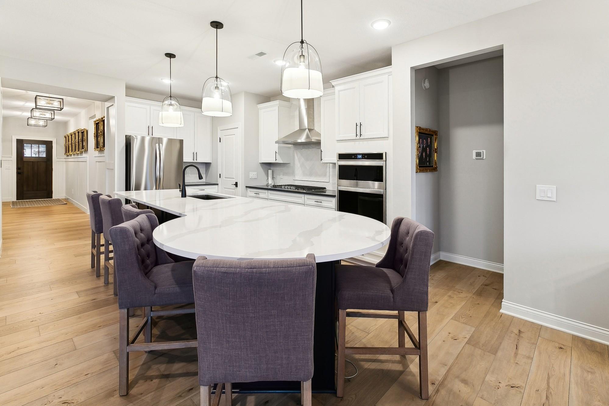 Second angle of the center island where tabletop space is located...great for family dinners with less fuss.