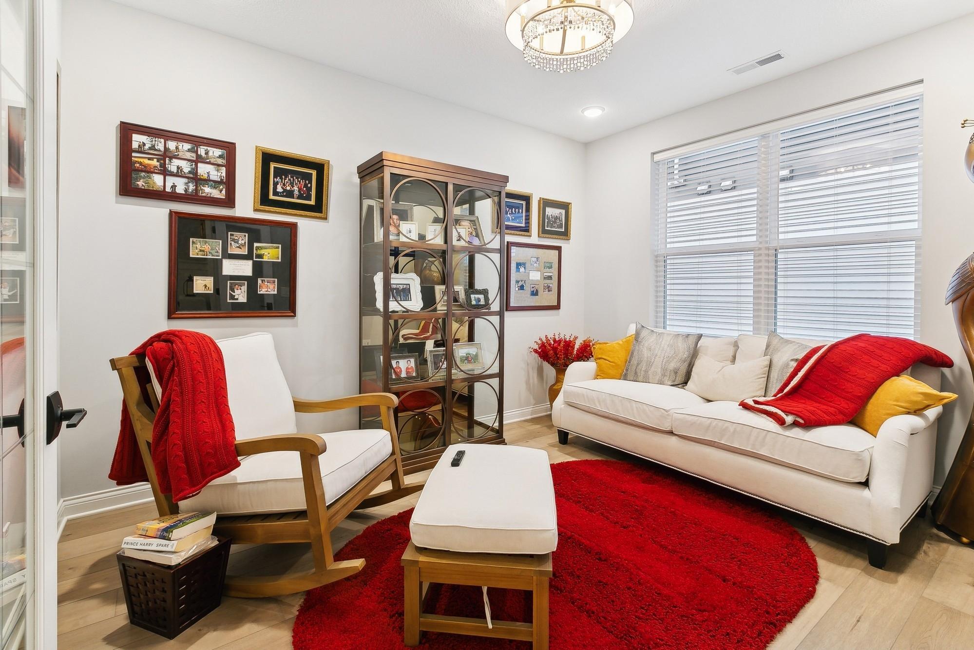 Lovely office/den offers space for formal office or casual den for more intimate, everyday lounging.