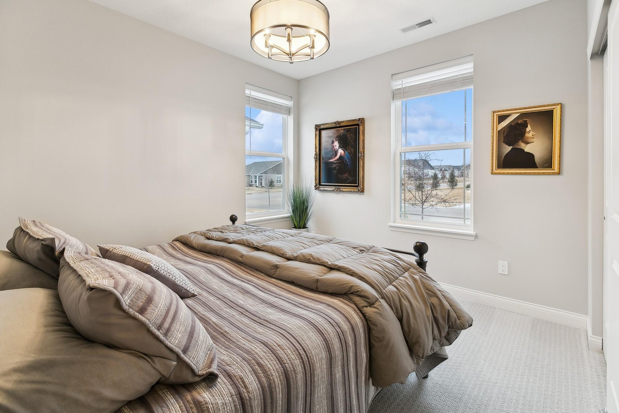 Second bedroom to the front of the home features great natural lighting and plenty of space.