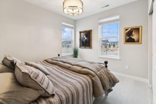 Second bedroom to the front of the home features great natural lighting and plenty of space.