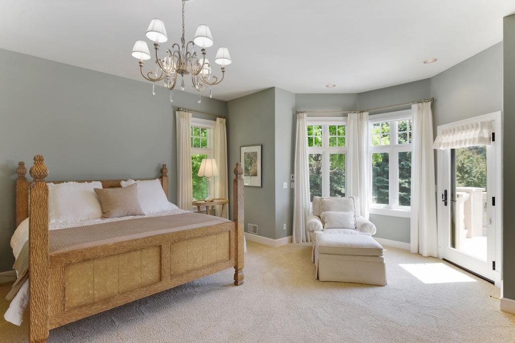 Enormous master suite is your own private oasis with sitting area and access to your private balcony