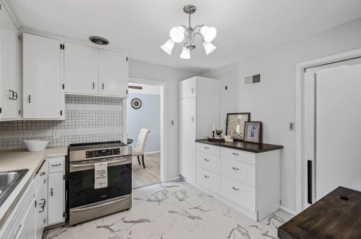 Additional cabinets were added with butcher-block counters