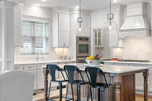Kitchen features upgraded countertops and appliances