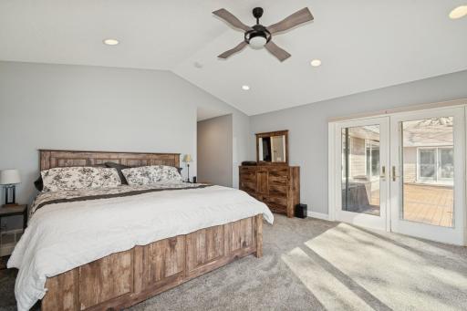 Primary bedroom suite walks out to maintenance free deck!