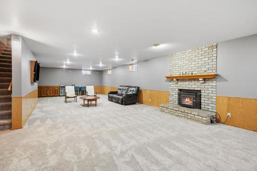 HUGE 55 x 22 wide open basement with second fireplace.