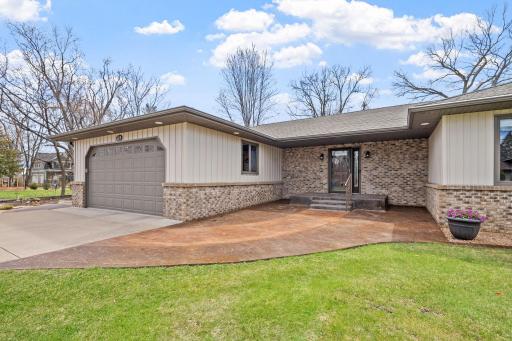 Custom stamped concrete and incredibly maintained landscaping.