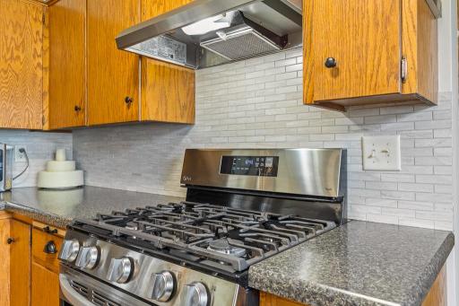 Beautiful gas stove and tile backsplash making it feel like a luxurious experience. There is ALSO electric available if you prefer electric.
