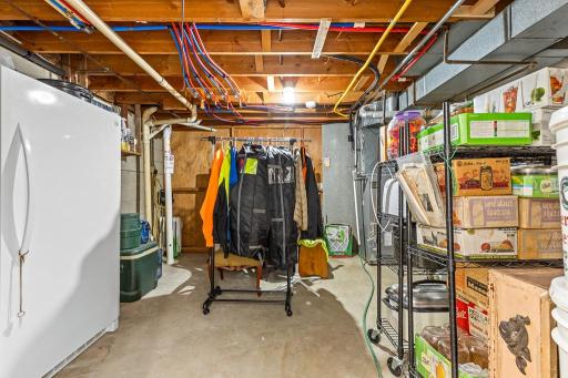 Mechanical room. This room features a new installed radon mitigation system, PEX plumbing updates, Washer & Dryer hookups, the forced air furnace (2004), and so much more!