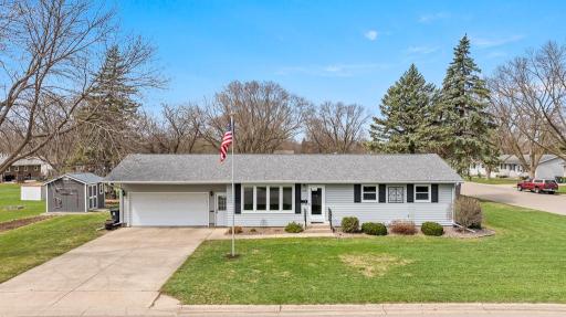 Nice newer concrete driveway for convenience leading to the attached garage and a sidewalk to the front door for your guests!