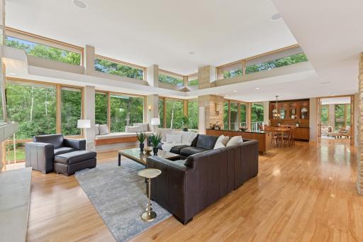 Panache! A clerestory of upper windows enhance & elevate this great room! Nature views & architectural genius.