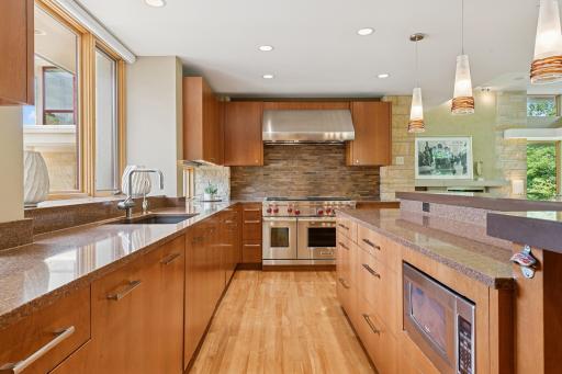 This could be the helping hand you have always desired. Yes Chef! Under-cabinet lighting by daylight or Lutron. Soft close cabinets & drawers. Dual Asko dishwashers & ample prep surfaces by Cambria. Behind the camera Subzero side by side & more!