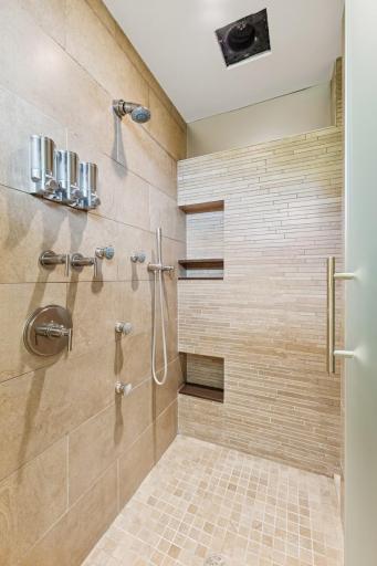 First of 2 custom showers in the 2 owner's baths! Easy step in with minimal threshold. Refresh with multiple water sprays. Nicely positioned away from the mirror spaces so shower steam won't fog your visage. All just for you & only you!