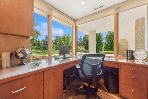 Nicely appointed office just for you with a bonus... see package deliveries in real time at the covered service entrance. Next Image, 2nd office or study. Everyone has their own space in this home, improved access, freedom from friction!
