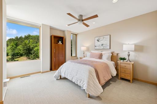 A 4th Bedroom, another suite with private bathing bath & a walk-in closet. Plus, direct access to an open air deck. Like the other 3 bedrooms on this level, it has multiple lighting options & a ceiling fan. Nice!
