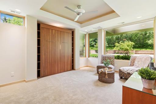 A Murphy bed descends into place whenever a 5th bedroom is desired. Naturally the views are of nature's tranquil beauty & a private bathroom with shower is ensuite. The walk-in closet is a plus & the rim lights in the ceiling feature are charming.