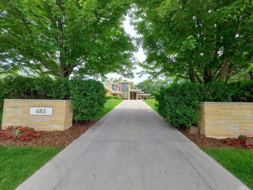 Excellent privacy & City living, yes both are features at home here! Rarely available within the 494/ 694 loop, acreage with superior privacy is happily bathed in natural light by ample windows. Available now without an extra long commute.