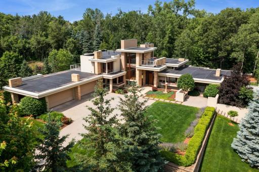 Brilliant architecture & a wealth of natural light! Come see how this home is enhanced by nature. This home rises to the occasion to enhance your entertaining & daily pleasures. Tree-mendous landscaped beauty, nicer by nature inside & out!