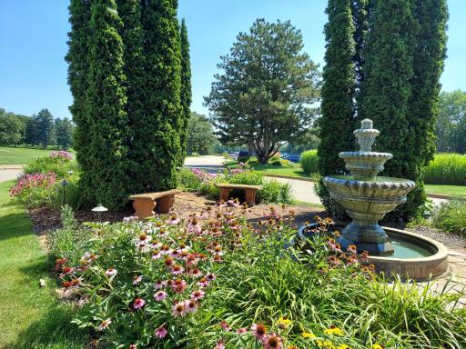 Country Club, membership with style and nicely near to Hidden Creek Trail. Enjoy the blissful setting of this fountain and flower gardens, before or after a round of golf.