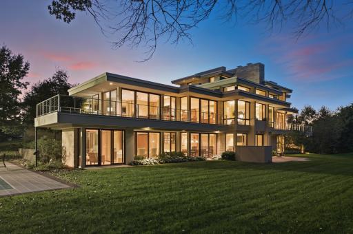 Multiple walkouts in the lower level & generous backyard, with outdoor kitchen, sport court & fire pit. All surrounded by trees. You could add a putting green or join any of 3 private country clubs within 8 miles, or play the public golf course.