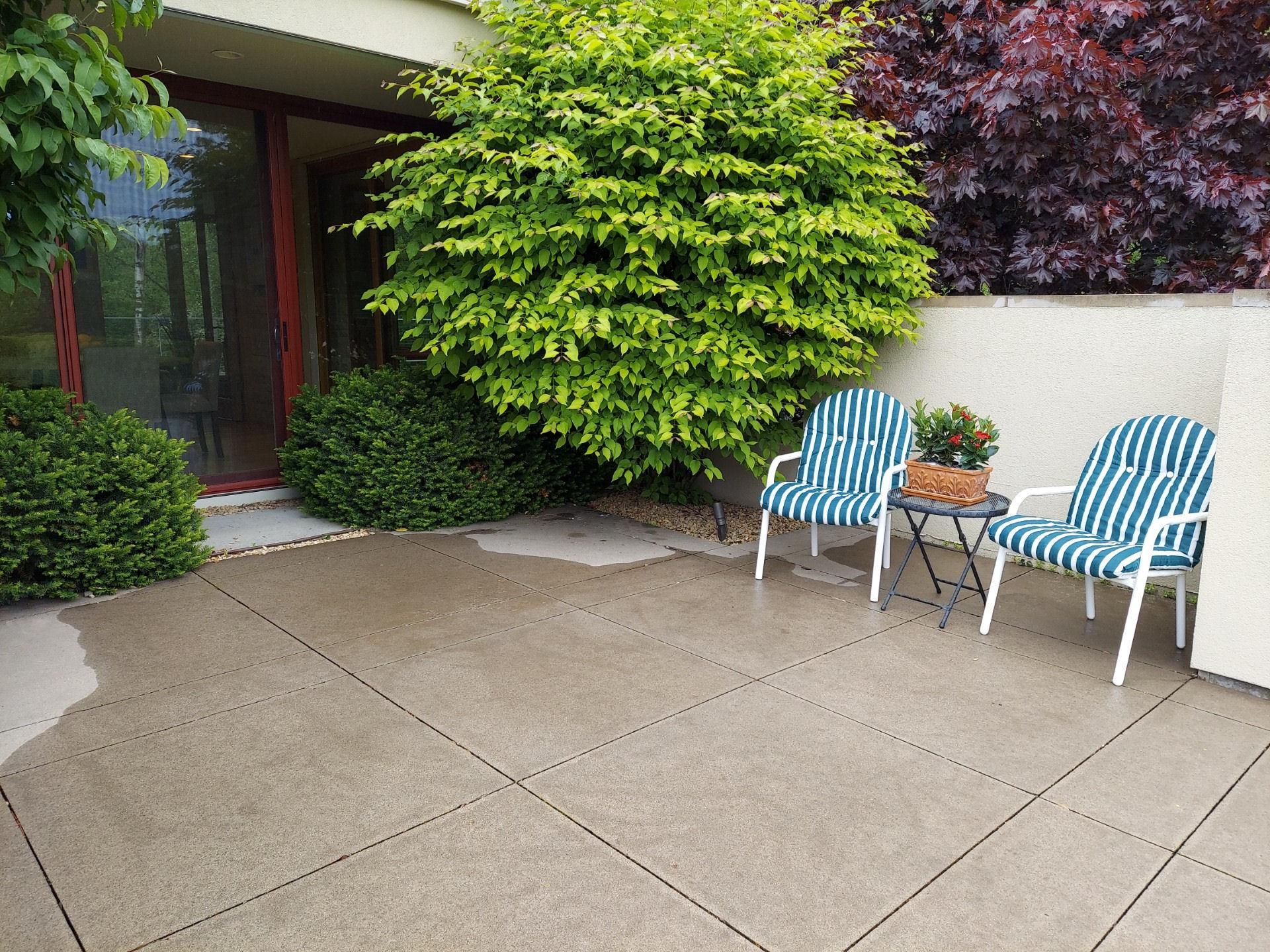The first of two patios with outdoor kitchens.