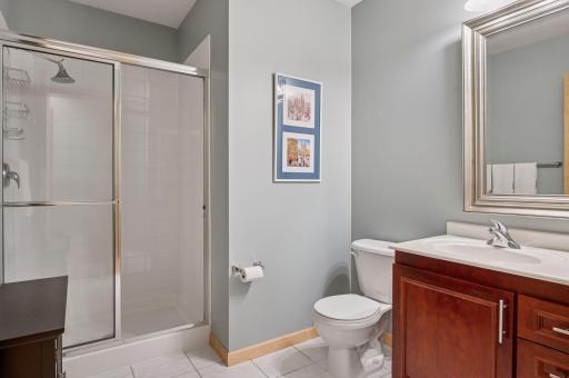 The "guest" 3/4 bathroom is spacious and has ceramic tile floors. Doorway into the bath has to be ADA compliant at 36".