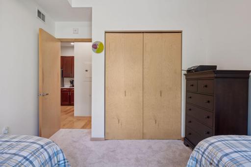 This closet is large. You can see the doorway and the "guest' bath is just two steps away.
