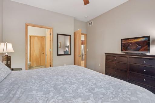 Primary bedroom is ensuite with a large full bath and walk-in closet.