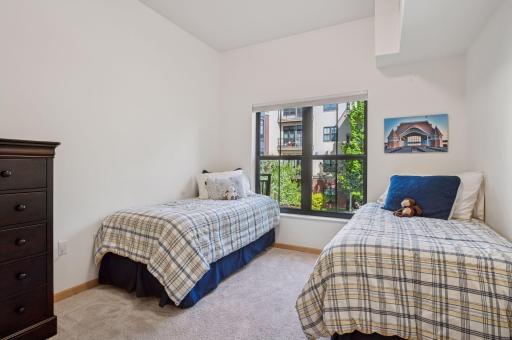 The "Guest" bedroom. This floor plan is "split" meaning that the bedrooms are not adjoining. This creates privacy and quiet zones.
