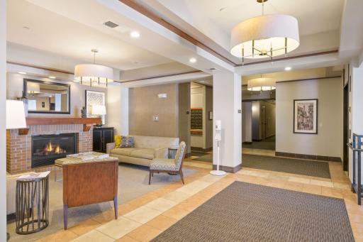 Inside the entrance is a lounge area with fireplace, mailroom and entrance to the courtyard.