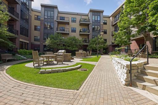 Three grilling areas with tables and seating. Unit 227 is not shown but the location is on the left.