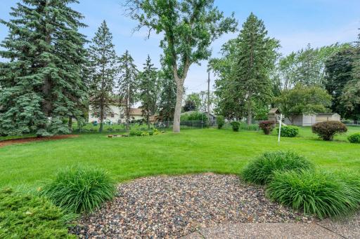 2126 Mapleview Avenue-large, well manicured backyard that is partially fenced.