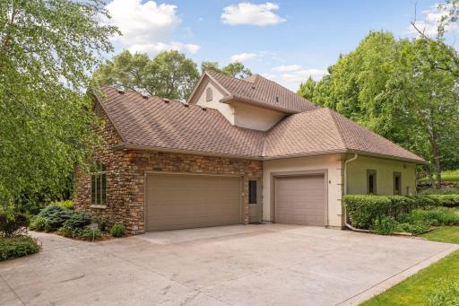 Spacious three car garage and stamped concrete drive