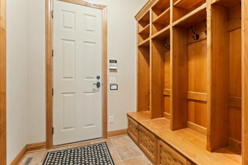 The main level garage access has a built in drop zone for coats and other belongings