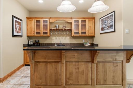 The bar features extra storage and a counter for serving