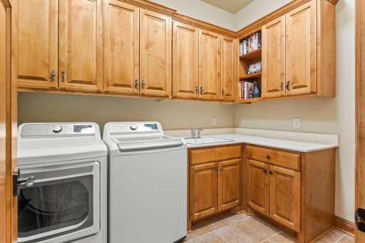 The main level laundry room is off of the kitchen