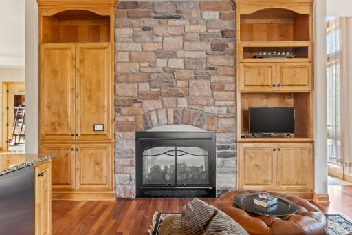 The double sided fireplace is another highlight in the information living room.
