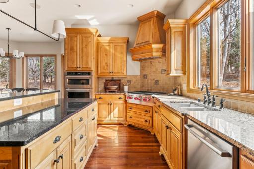 The kitchen features stainless steel appliances.