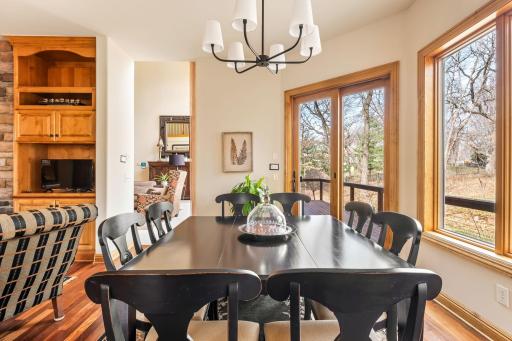 The kitchen features a lovely eat-in/informal dining space.