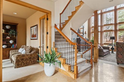 From the foyer the beautiful staircase takes you to the second floor.