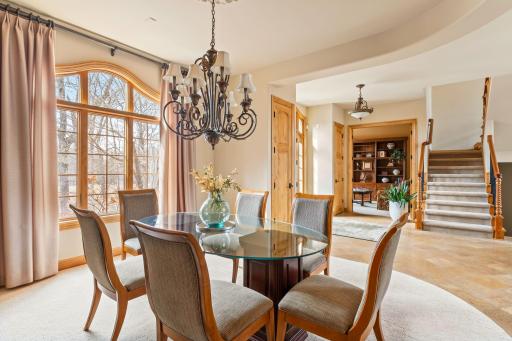 To one side of the foyer is the formal dining room