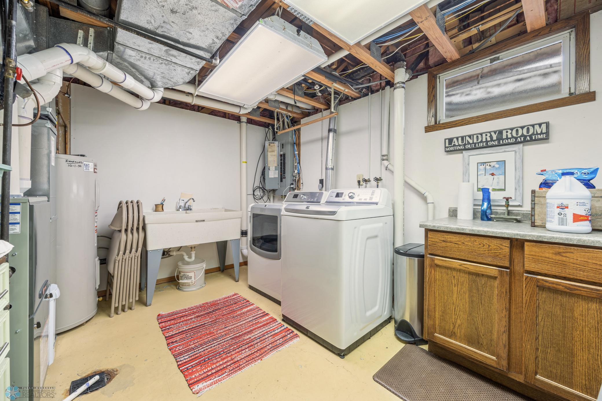 Utility/laundry - W/D included - radon mitigation system - utility sink