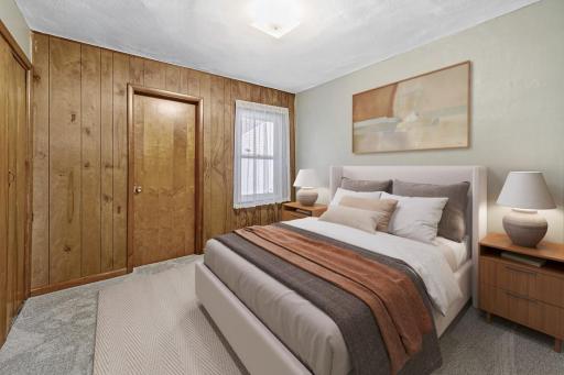Virtually staged and enhanced primary bedroom.jpg