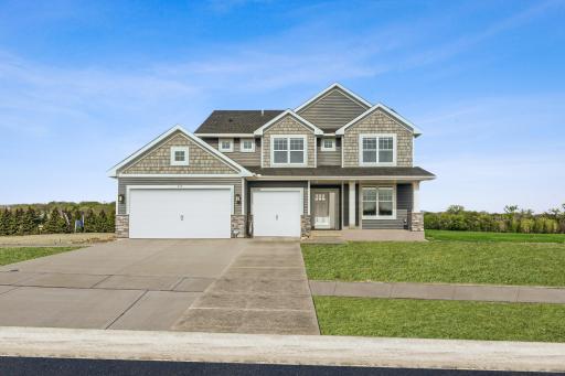 Photo is of the actual model. Exquisite compliments of shakes, stone, and siding in a fantastic Delano neighborhood.