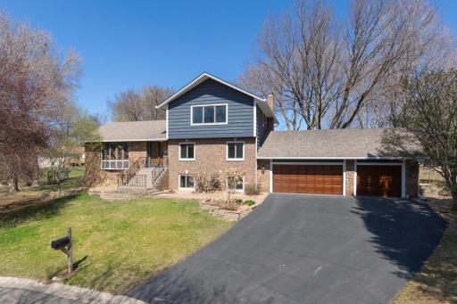 Welcome home to 15361 Village Woods Drive!
