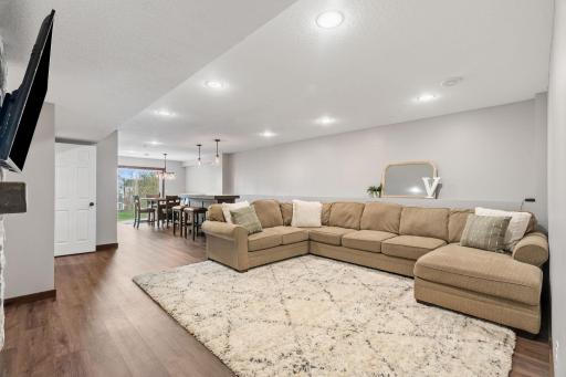 Approximately 800 sq. ft. finished basement complete with a mini bar, bathroom with shower, cozy fireplace, and an additional bedroomâperfect for guests or extra living space.