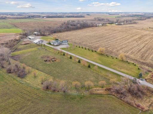 Generous land surrounding the home ensures a tranquil and private sanctuary, offering a peaceful oasis away from neighbors.