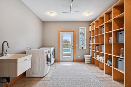 2nd mudroom with tons of storage and walks through from the pool/deck to the main floor bathroom