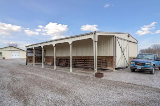 Set against a backdrop of scenic landscapes, the cattle barn offers not only functionality but also a picturesque view for both the animals and caretakers.
